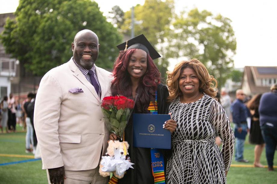 Graduate and family members pose together after ceremony