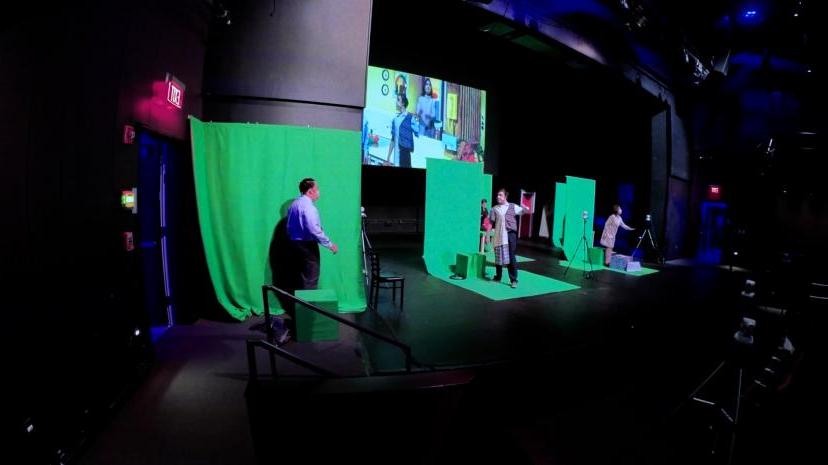 Photos of actors using socially-distanced green screens during the Salem State performance of "A Long Christmas Ride 首页."